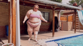367733605_relaxing-after-a-swim-my-growing-belly-is-almost-too-much-f_0.m4v